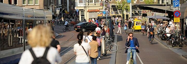  Passengers and trams on a road