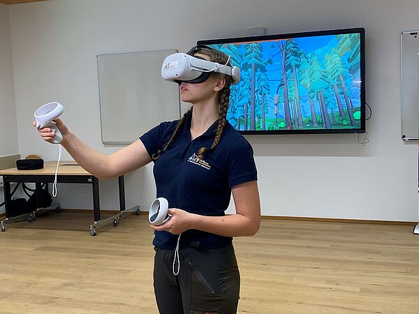 Forestry student with VR-headset