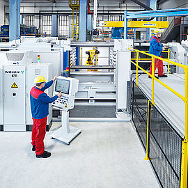 continuous casting line with employees in front